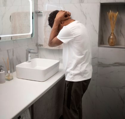 full-shot-man-being-sad-bathroom (2)